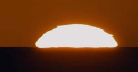 Le coucher de Soleil au rayon vert