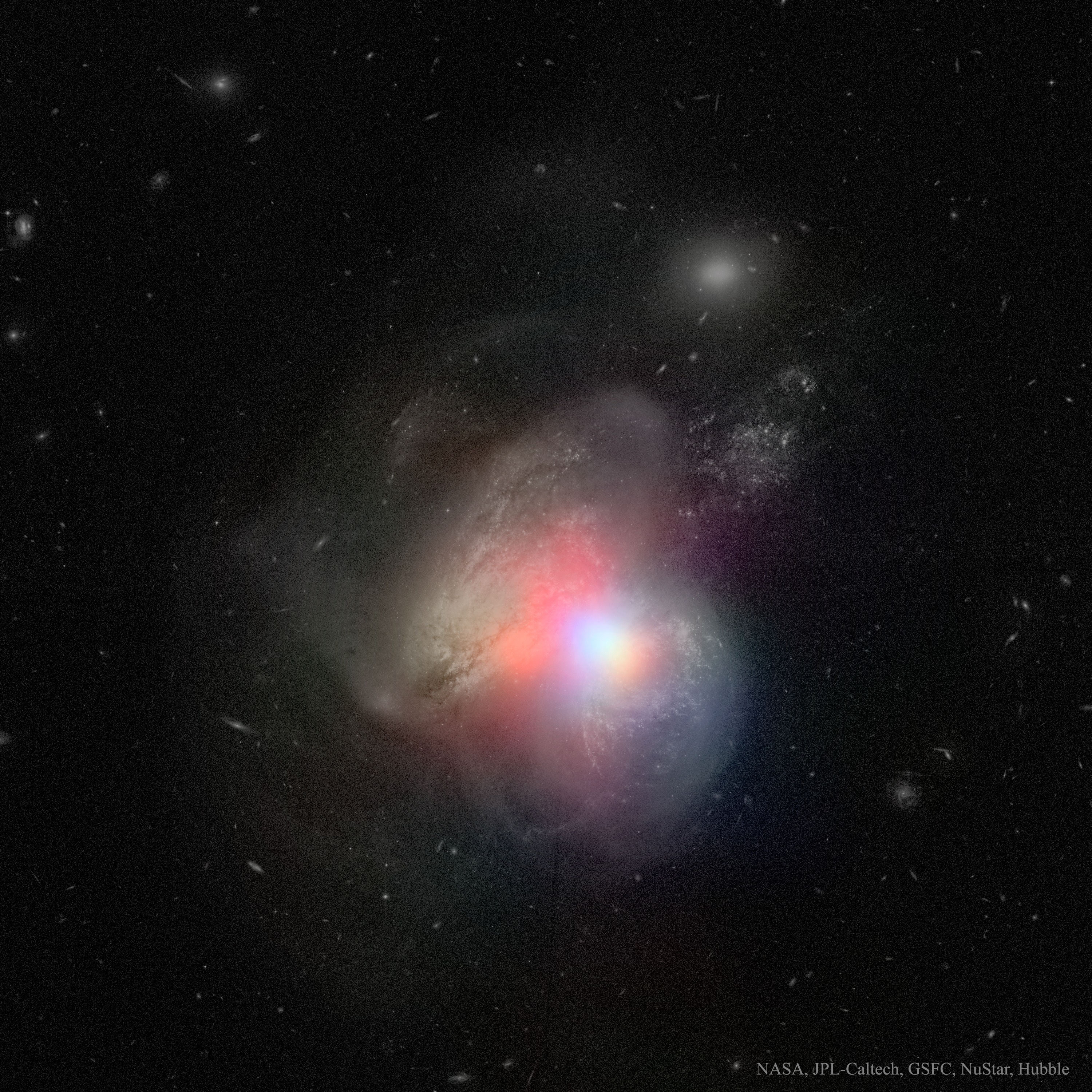 Arp 299, trous noirs dans des galaxies en collision