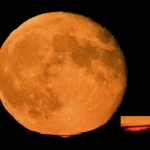 Lune orange, rayon rouge