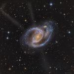 Dans les bras de NGC 1097