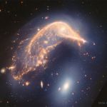 Arp 142, galaxies en interaction par le James Webb