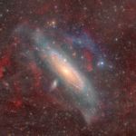 La galaxie d'Androm&egrave;de &agrave; travers gaz et poussi&egrave;re
