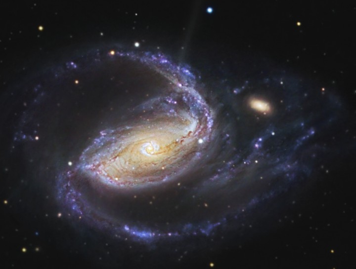 Dans les bras de NGC 1097